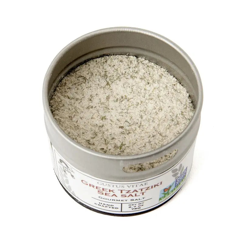 Gustus Vitae Greek Tzatziki Sea Salt in a silver tin, finely ground with herbs for gourmet flavor enhancement.