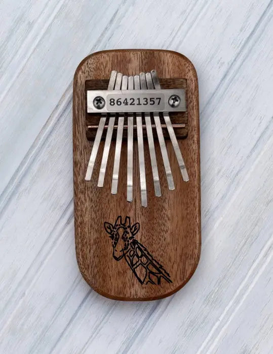 Giraffe Engraved Thumb Piano Mountain Melodies