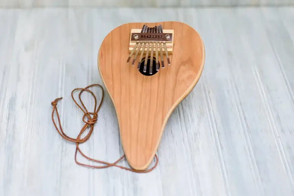 Half Shell Thumb Piano Mountain Melodies