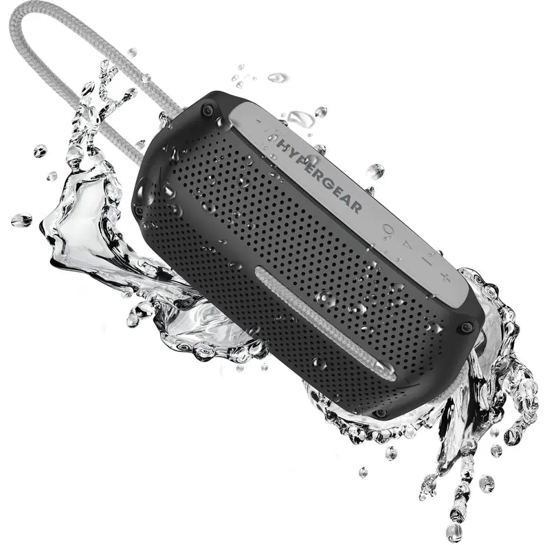 Black waterproof wireless speaker with textured grip and silver accents, splashing water for an outdoor vibe.