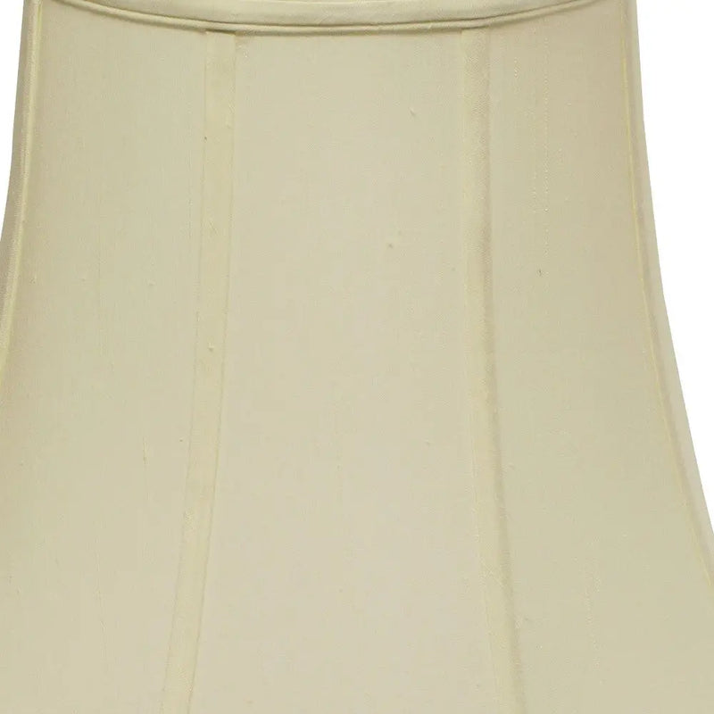Ivory fabric lamp shade with a classic pleated design, ideal for stylish home decor and lighting solutions.
