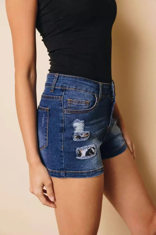 Jacobs Ripped Denim Shorts Stay Warm in Style