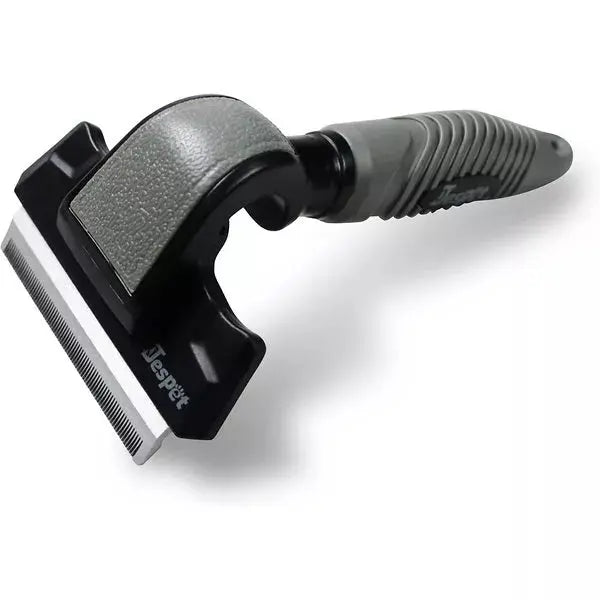 Self-cleaning pet grooming tool with a gray rubber grip and stainless steel blade for shedding removal.