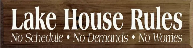 Wooden sign with "Lake House Rules" in white script on a dark brown background, perfect for rustic home decor.