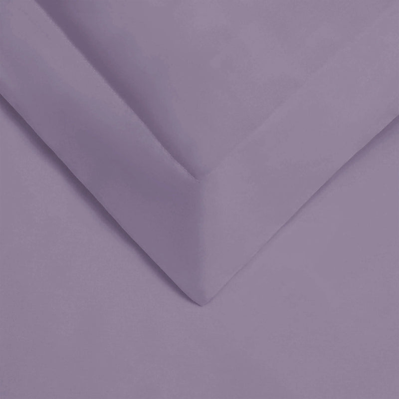 Lavender soft microfiber fitted sheet, smooth texture, perfect for enhancing bedroom decor and comfort.
