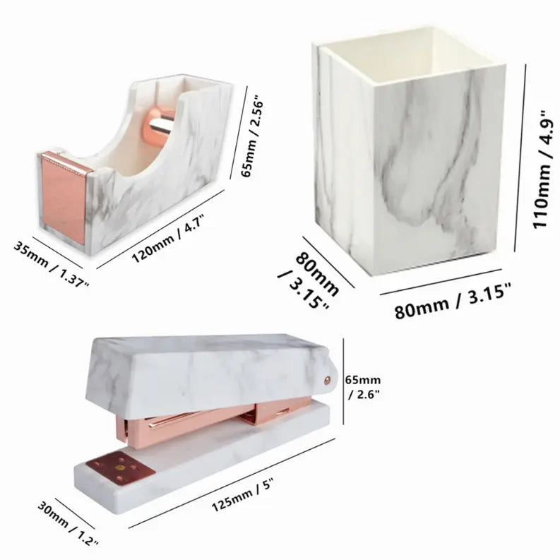 Marble and rose gold desk accessories set: stapler, tape dispenser, and pen holder, stylish and modern office decor.