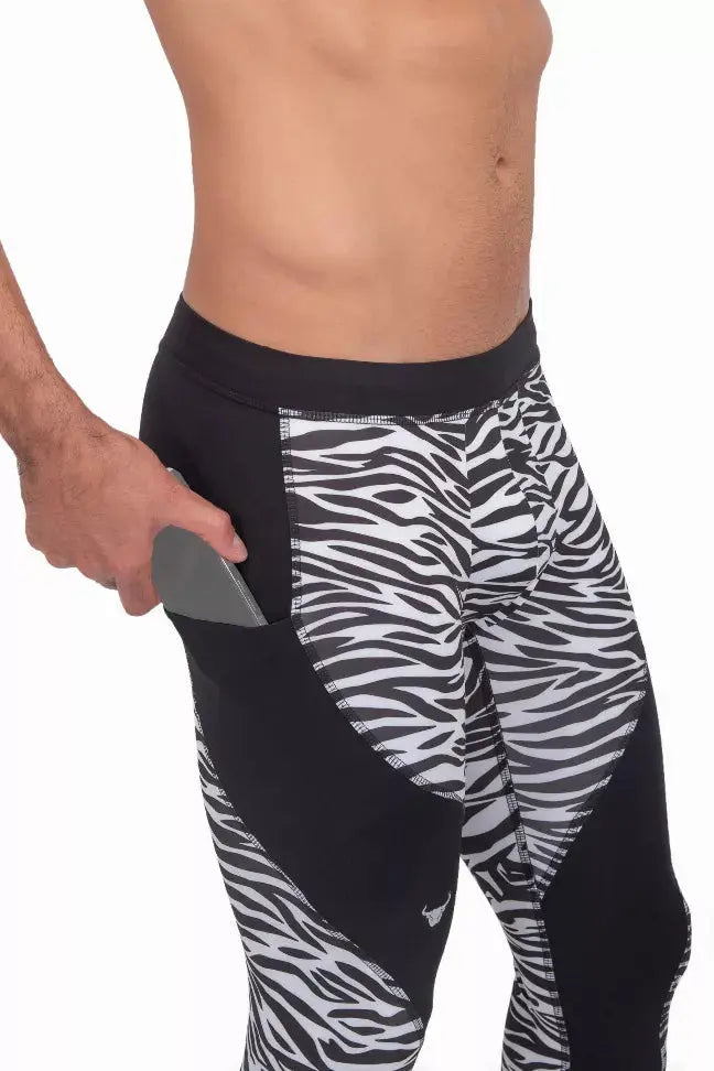 Men's black and white zebra print leggings with a side pocket, made from breathable, stretchy fabric for activewear.