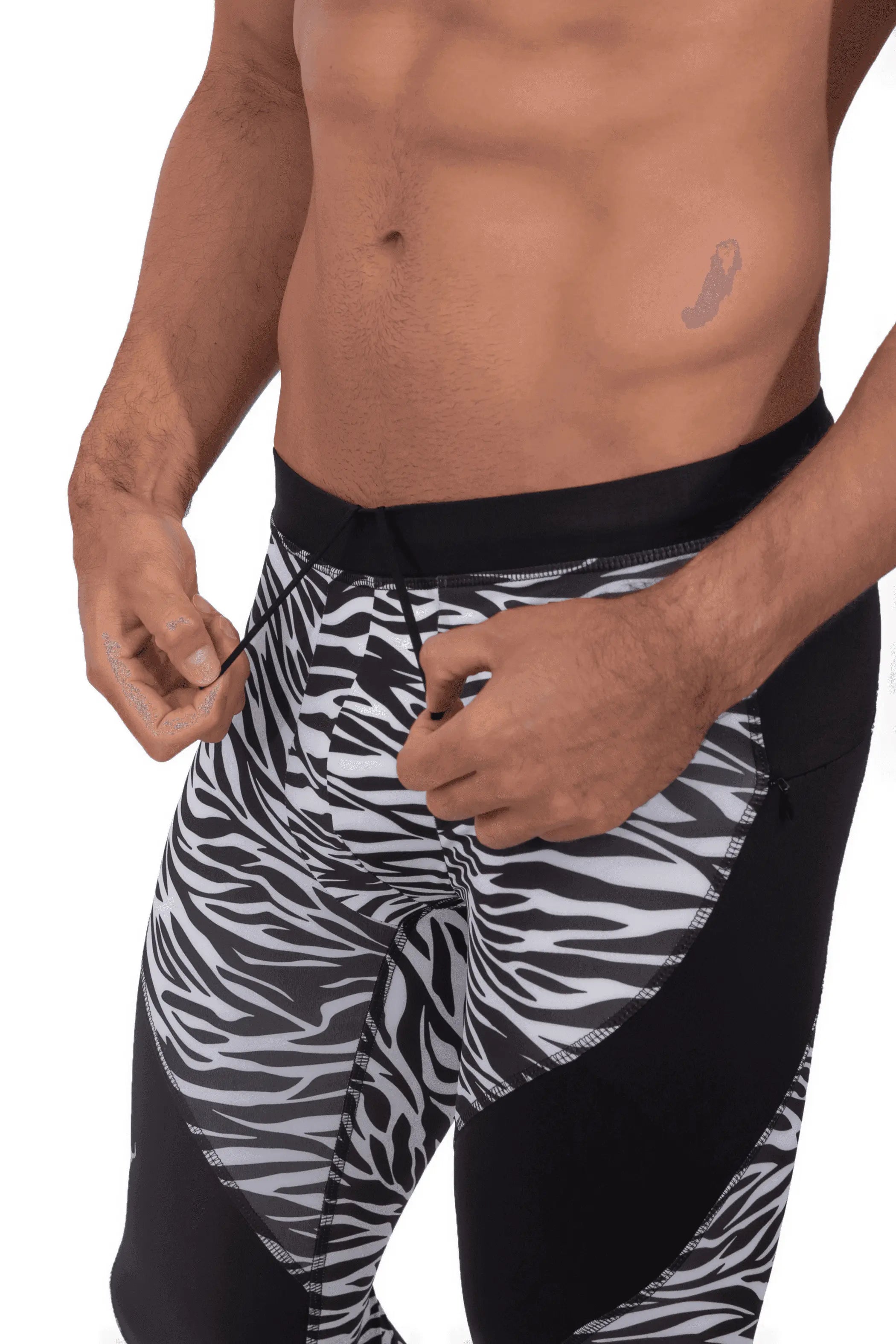 Men's black and white zebra print compression leggings with a black waistband, perfect for activewear or workouts.