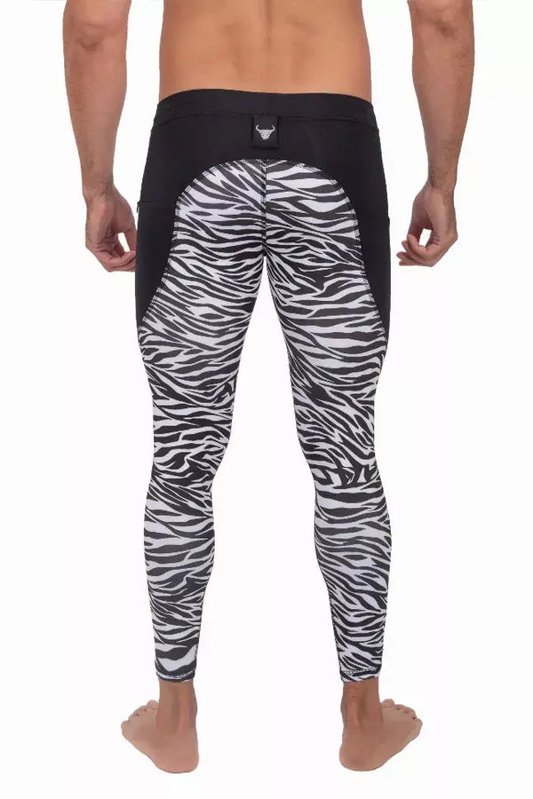 Men's black and white zebra print leggings, stretchy fabric, sleek design, ideal for activewear and workouts.
