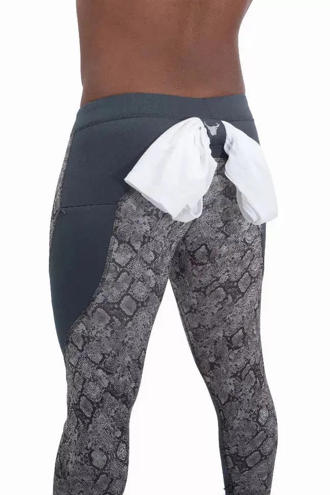 Black and gray snake print leggings with a stylish white tie detail at the back. Perfect for gym or casual wear.