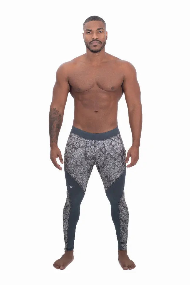 Men's black snake print leggings made from moisture-wicking material for enhanced comfort and performance.