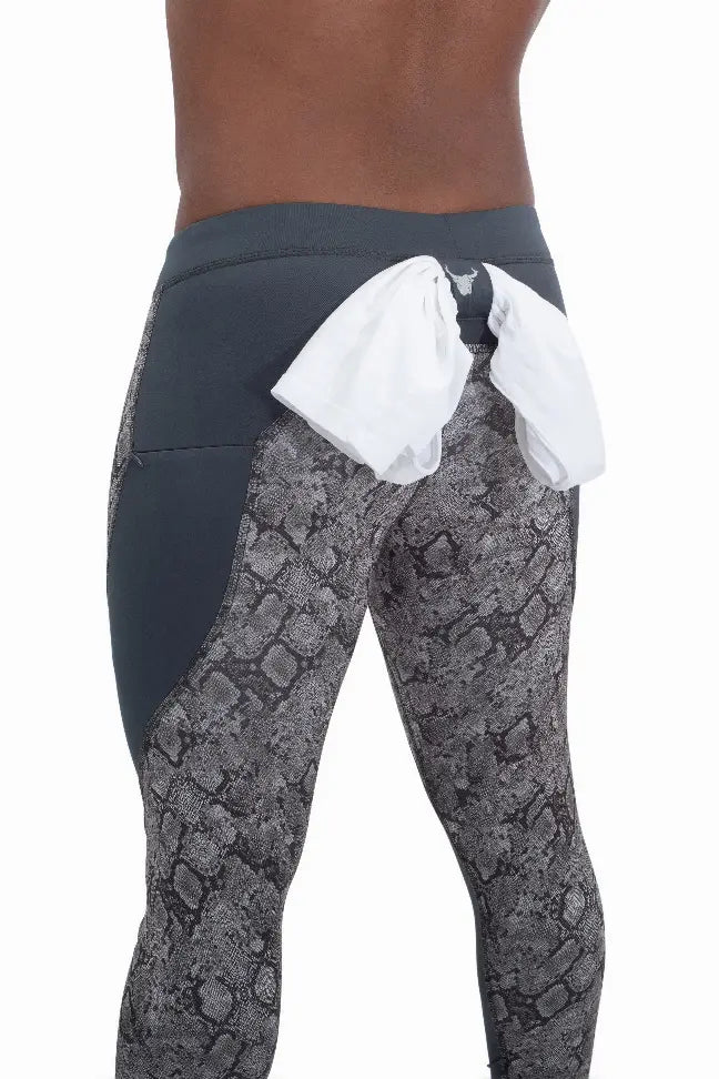 Women's gray snake print leggings with a black waistband, featuring a stylish white tie detail at the back.
