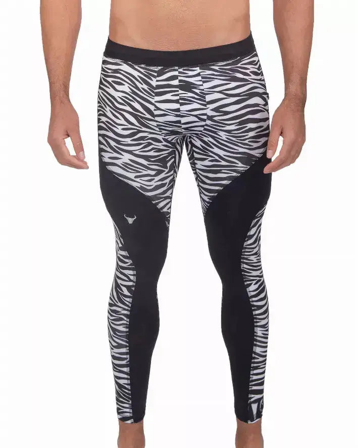 Men's black and white zebra print compression leggings, crafted from moisture-wicking polyester for active wear.