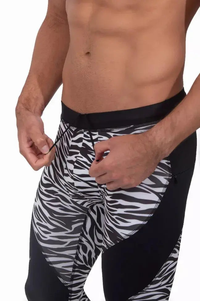 Men's zebra print compression leggings in black and white, featuring a sleek design and adjustable drawstring waist.