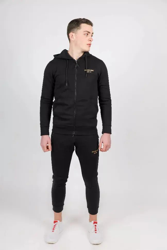 Black zip-up hoodie and jogger set for men, stylish with gold accents, made from soft, breathable cotton.