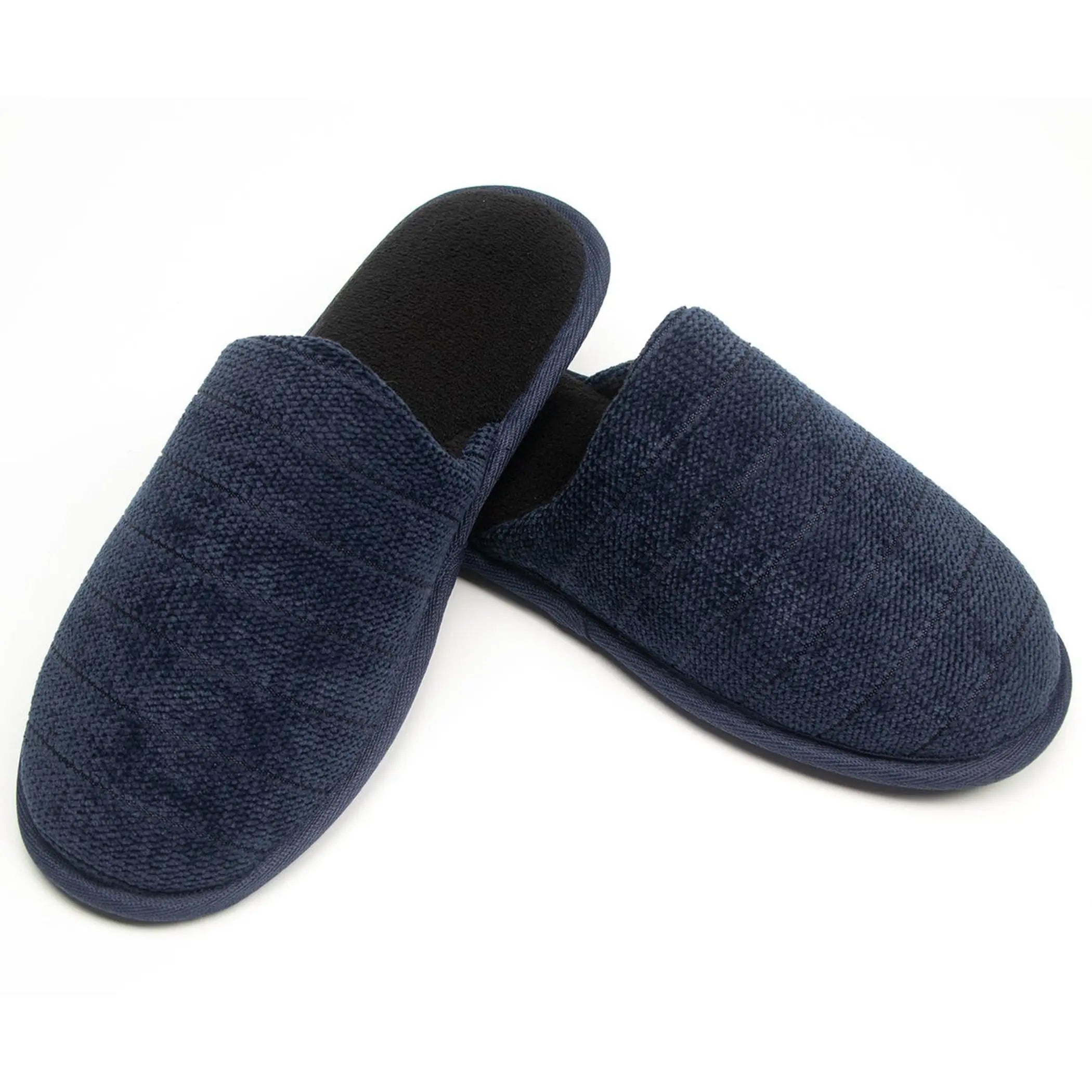 Navy blue soft fabric slippers with quilted design and black interior for comfort and style. Perfect for indoor wear.