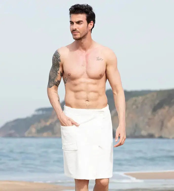 White cotton men's beach towel wrap with pockets, perfect for summer outings by the shore.