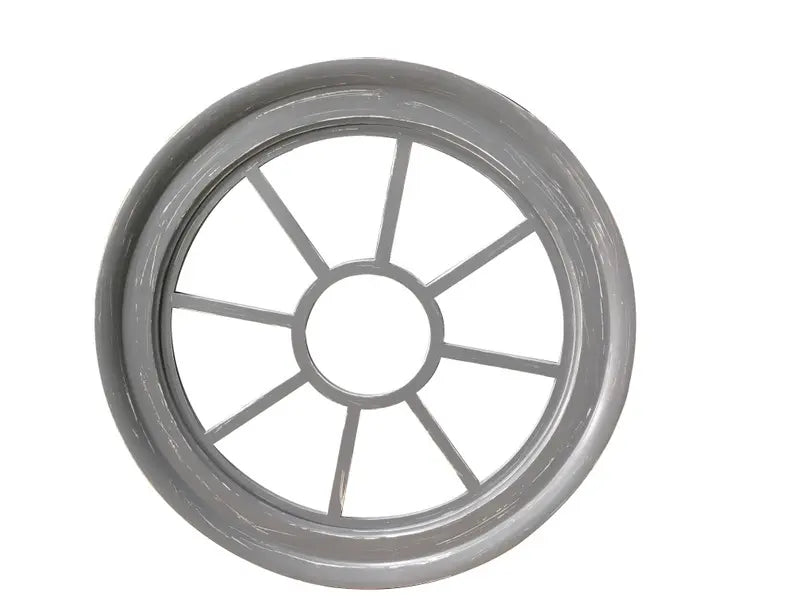 Gray decorative wall mirror with a sunburst design, featuring a circular frame and eight elegant spokes.