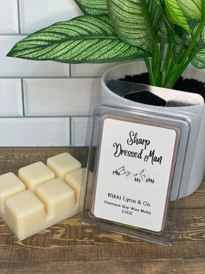 Sharp Dressed Man premium soy wax melts, beige, packaged in a clear clamshell, perfect for home fragrance.
