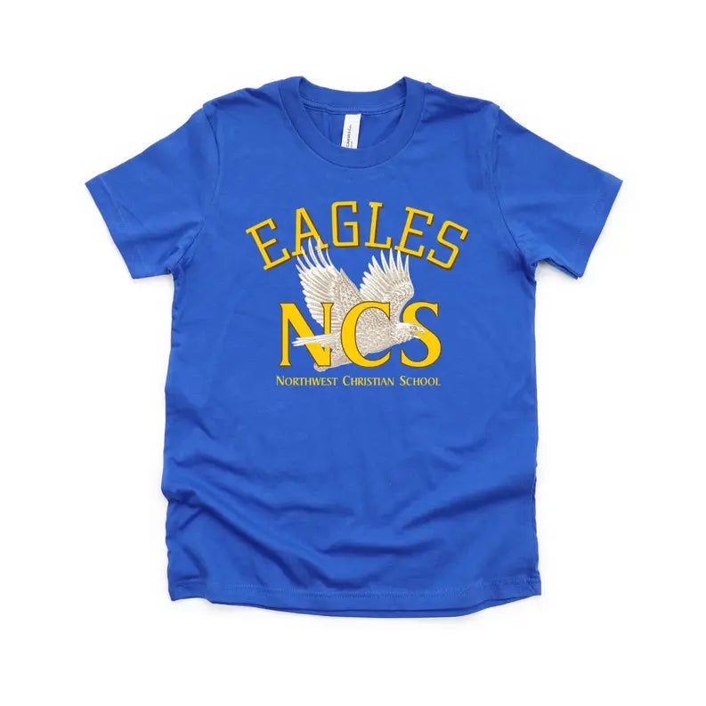 Blue cotton t-shirt featuring "EAGLES" and "NCS" in yellow, with a wing graphic for Northwest Christian School.
