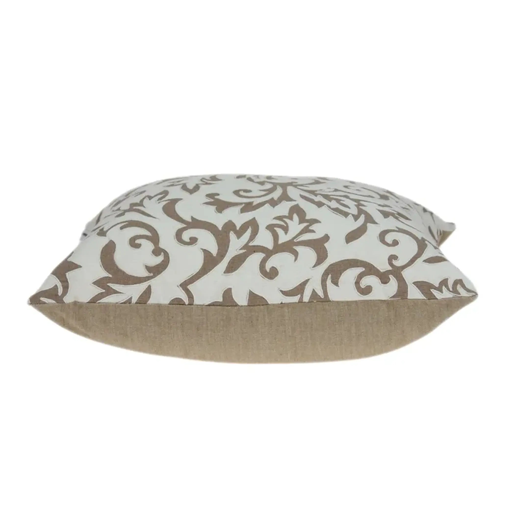 Cream and beige decorative pillow with intricate floral pattern, made from soft fabric, perfect for home decor.