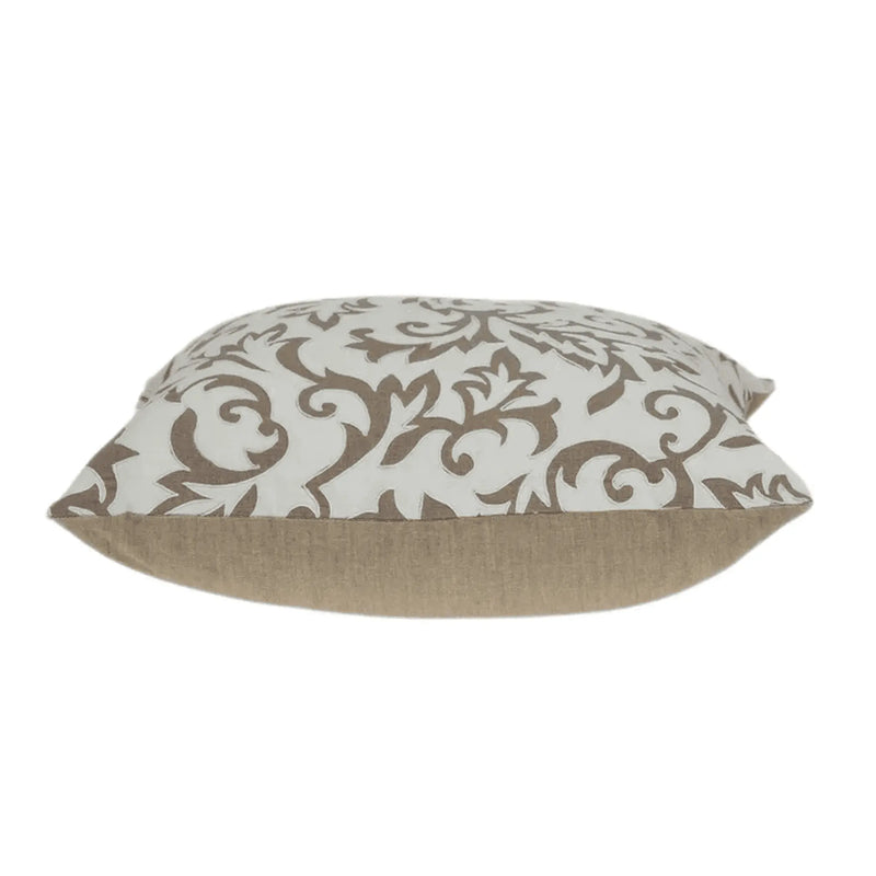 Cream and beige decorative pillow with intricate floral pattern, made from soft fabric, perfect for home decor.