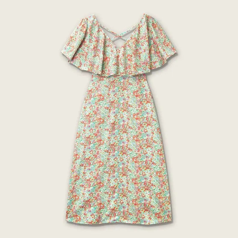 Floral off-the-shoulder dress in pastel colors with a ruffled hem and crisscross back design. Perfect for summer outings.