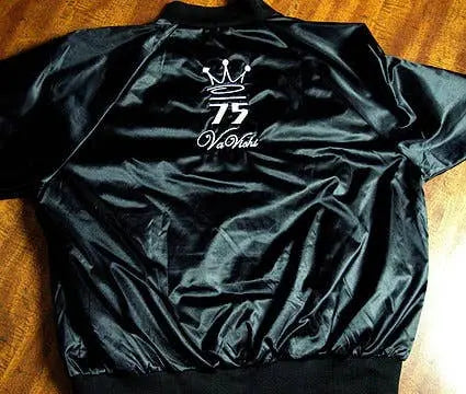 Black satin bomber jacket with embroidered crown and "75 VaVash" logo on the back. Trendy and stylish outerwear.