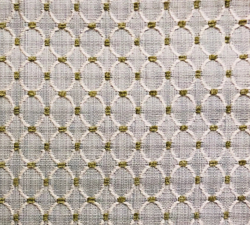 Textured light beige fabric with oval patterns in muted olive green, ideal for upholstery or curtains.