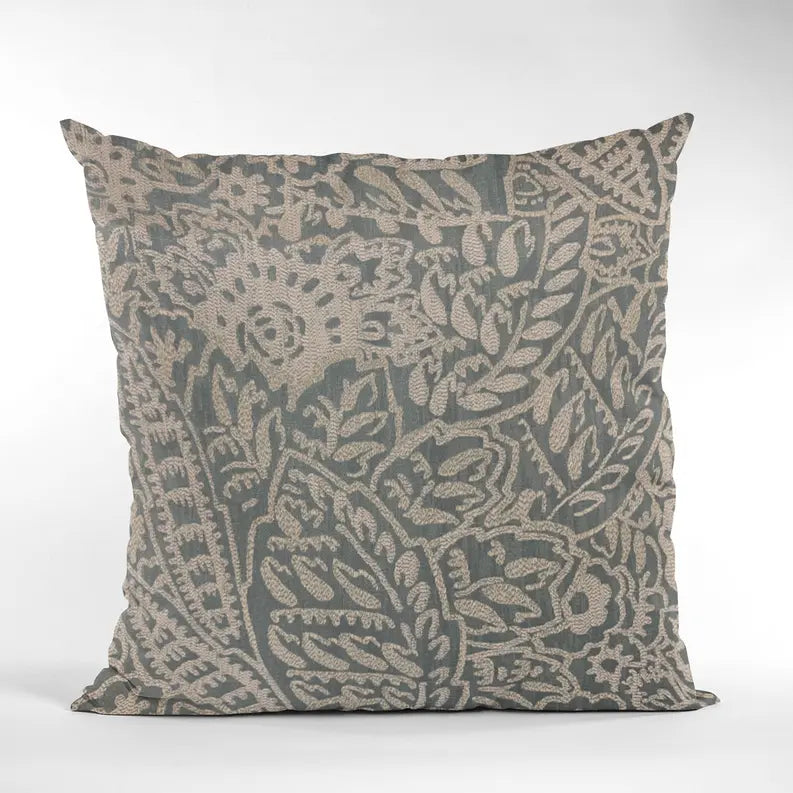 Decorative pillow in muted blue and beige floral print, crafted from soft cotton, ideal for bohemian home decor.