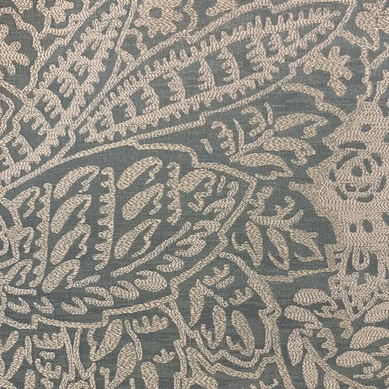 Teal and cream floral jacquard fabric, featuring intricate leaf patterns, ideal for upholstery or home decor projects.
