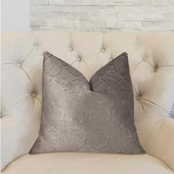 Taupe velvet decorative pillow with circular pattern, perfect for modern living room decor.