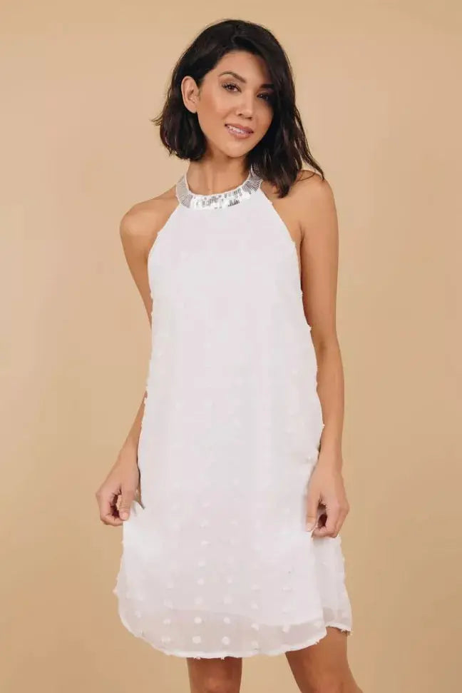 Raquel Sleeveless Pompom Mini Dress Stay Warm in Style