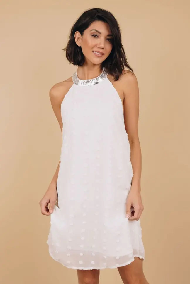 Raquel Sleeveless Pompom Mini Dress Stay Warm in Style