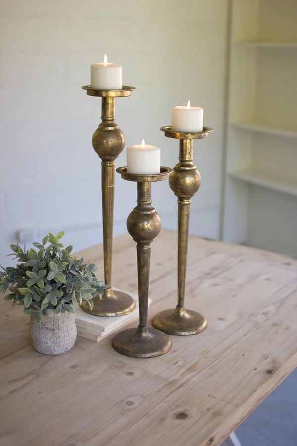 SET OF THREE ANTIQUE BRASS FINISH CANDLE STANDS Kalalou