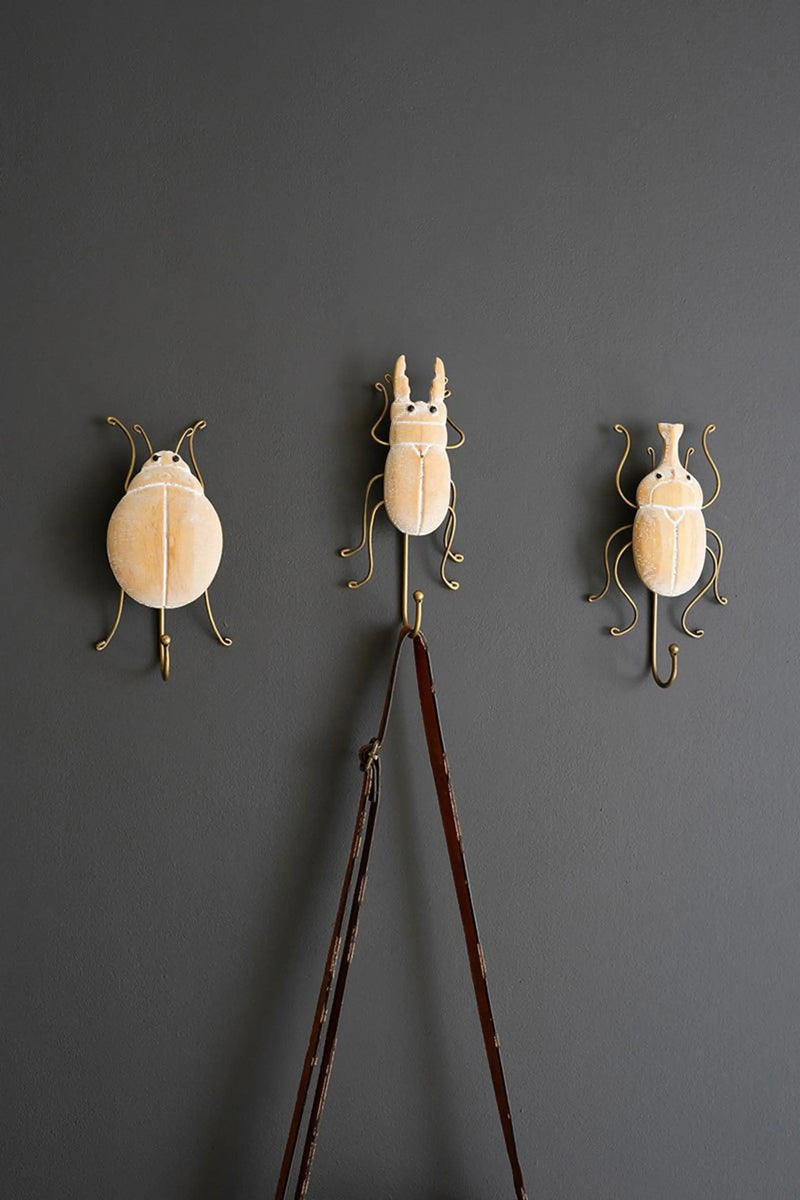 SET OF THREE CARVED WOOD AND WIRE BEETLE WALL HOOKS Kalalou