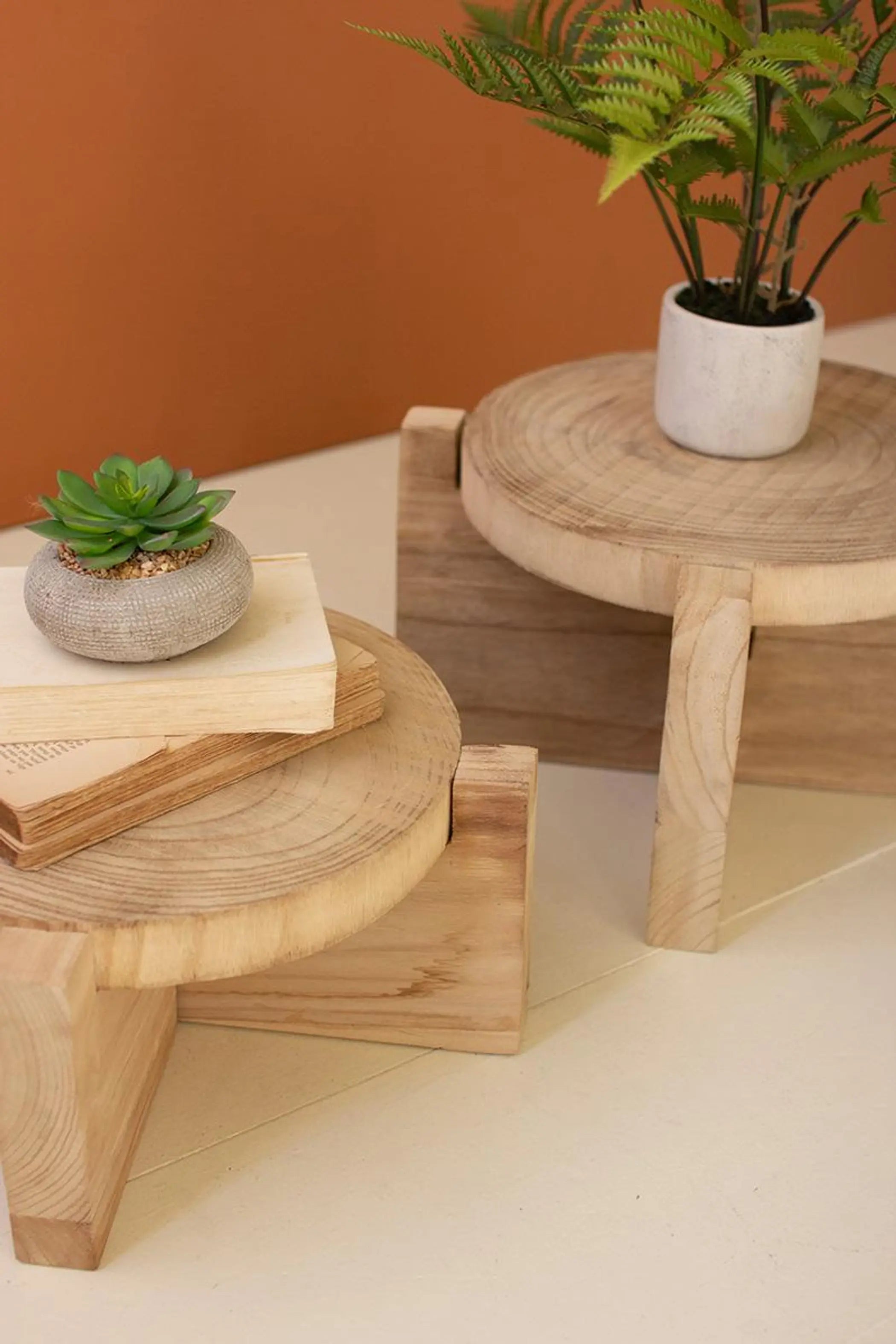 SET OF TWO WOODEN DISPLAY STOOLS Kalalou