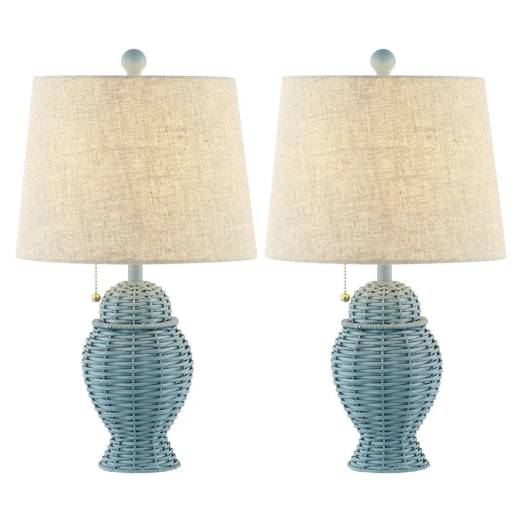 Blue woven wicker table lamps with cream fabric shades and pull chain, perfect for coastal-themed decor. Set of two.
