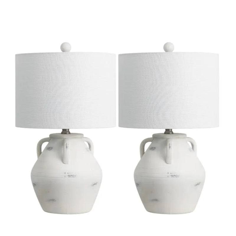 Set of 2 white ceramic table lamps with textured fabric shades and unique jug-shaped bases, perfect for modern decor.