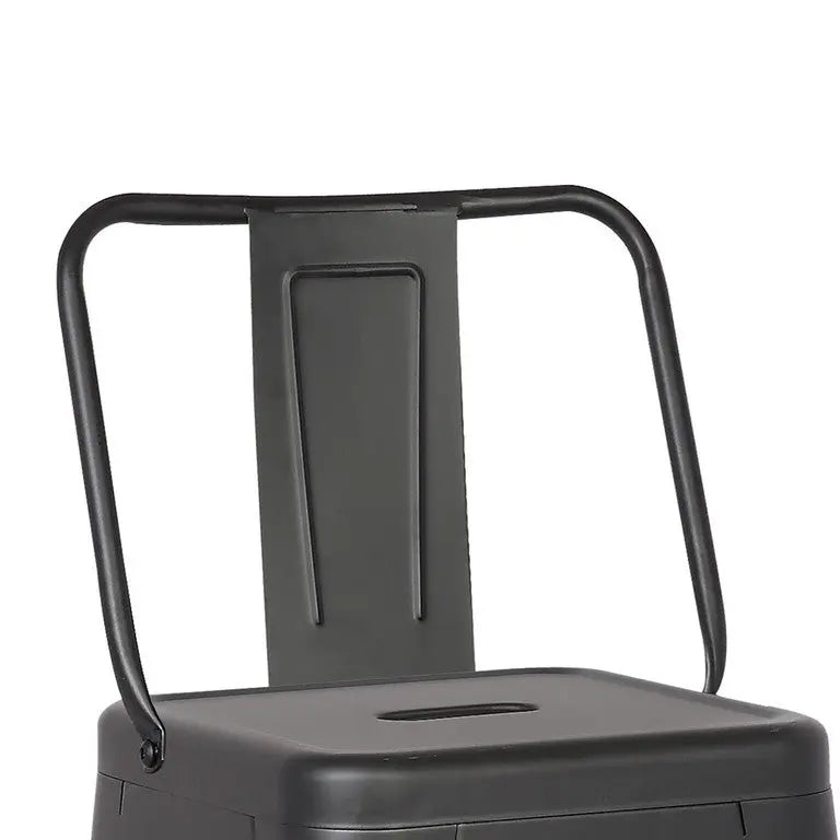 Black metal chair with a minimalist design, featuring a backrest and a cutout handle for easy mobility.