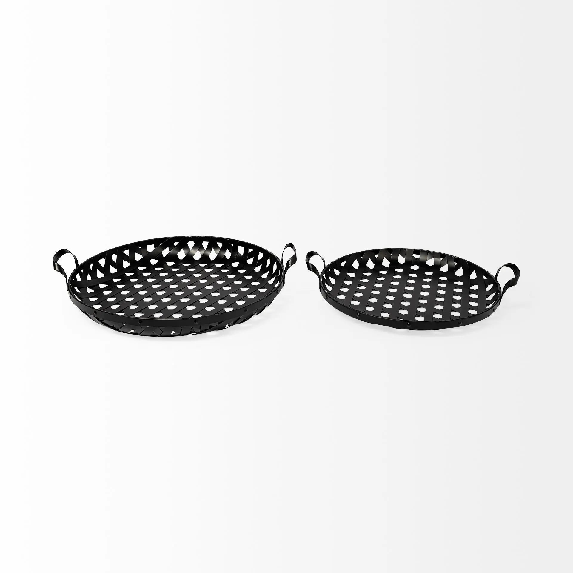 Set of two black metal trays with cut-out patterns and handles, perfect for serving or home decor.