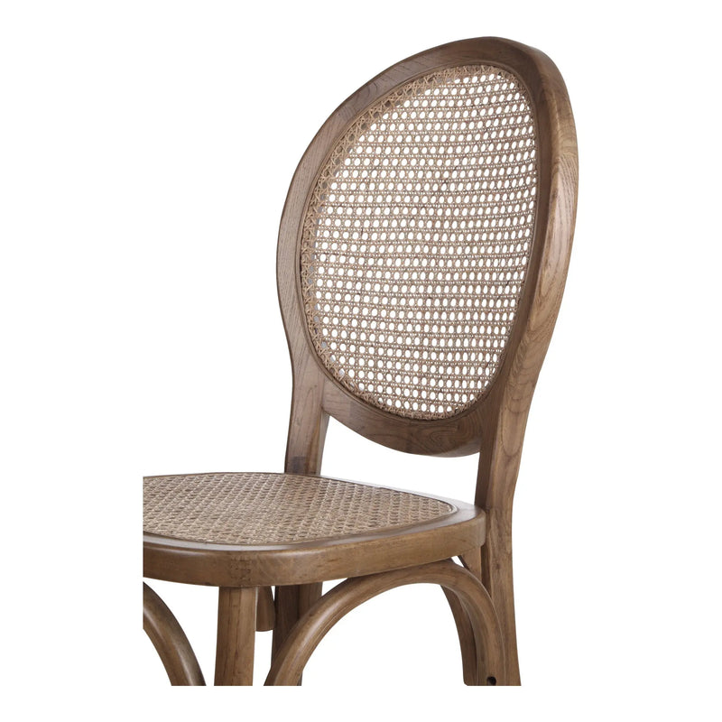 Natural rattan dining chair with a curved wooden frame and a woven cane backrest in a classic, elegant design.