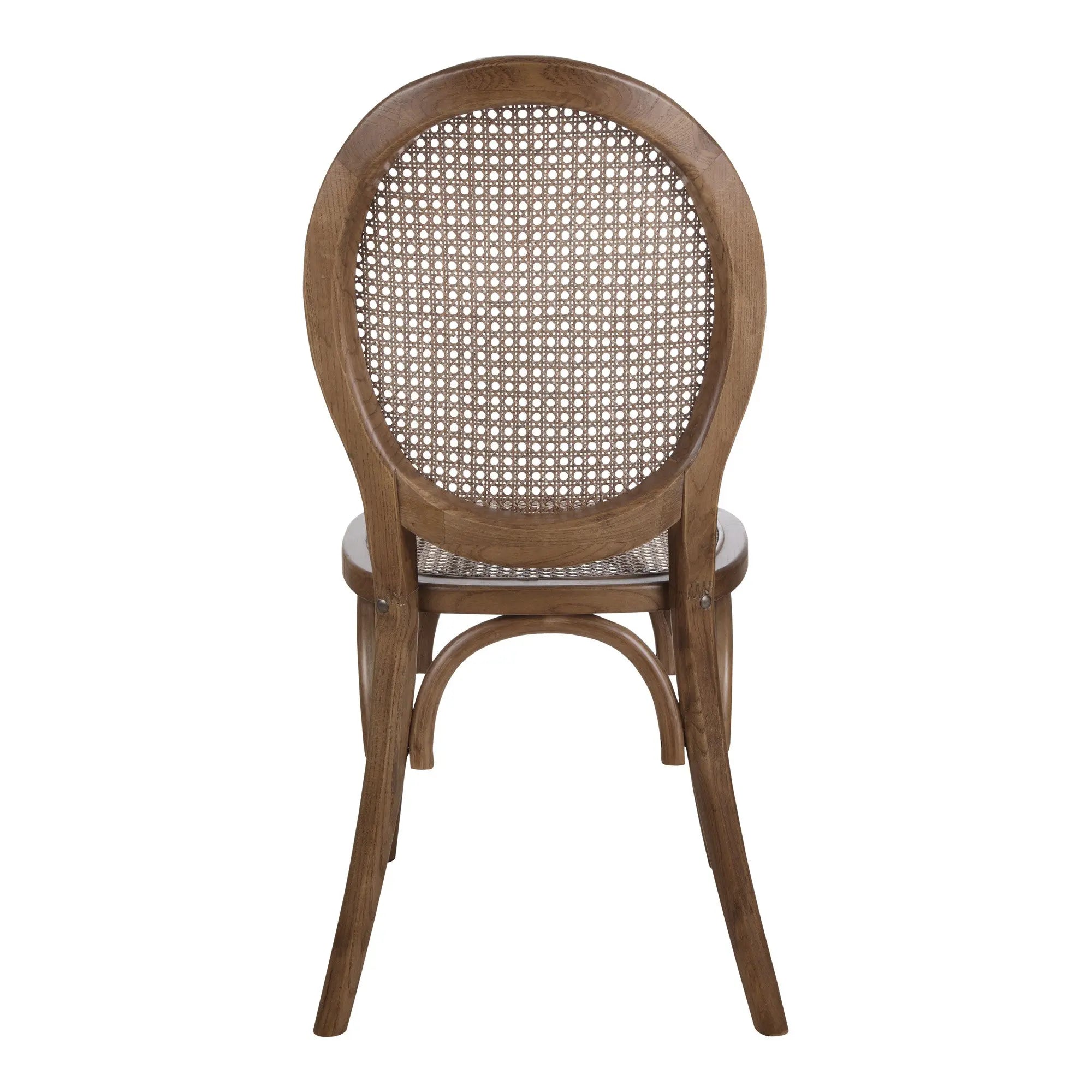 Natural wood cane back dining chair with a classic oval shape and vintage finish.