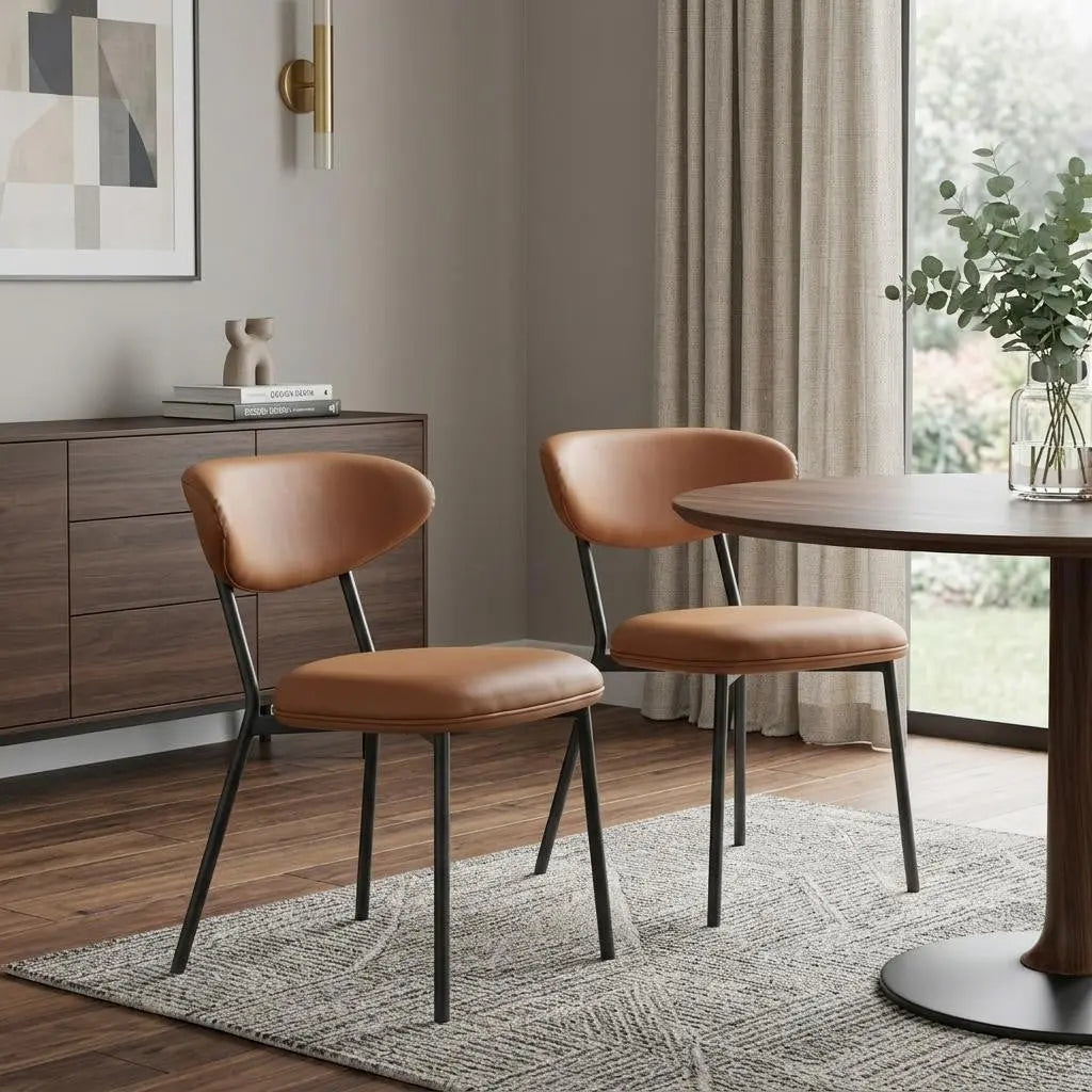Modern brown leather dining chairs with sleek black metal legs in a stylish interior setting.