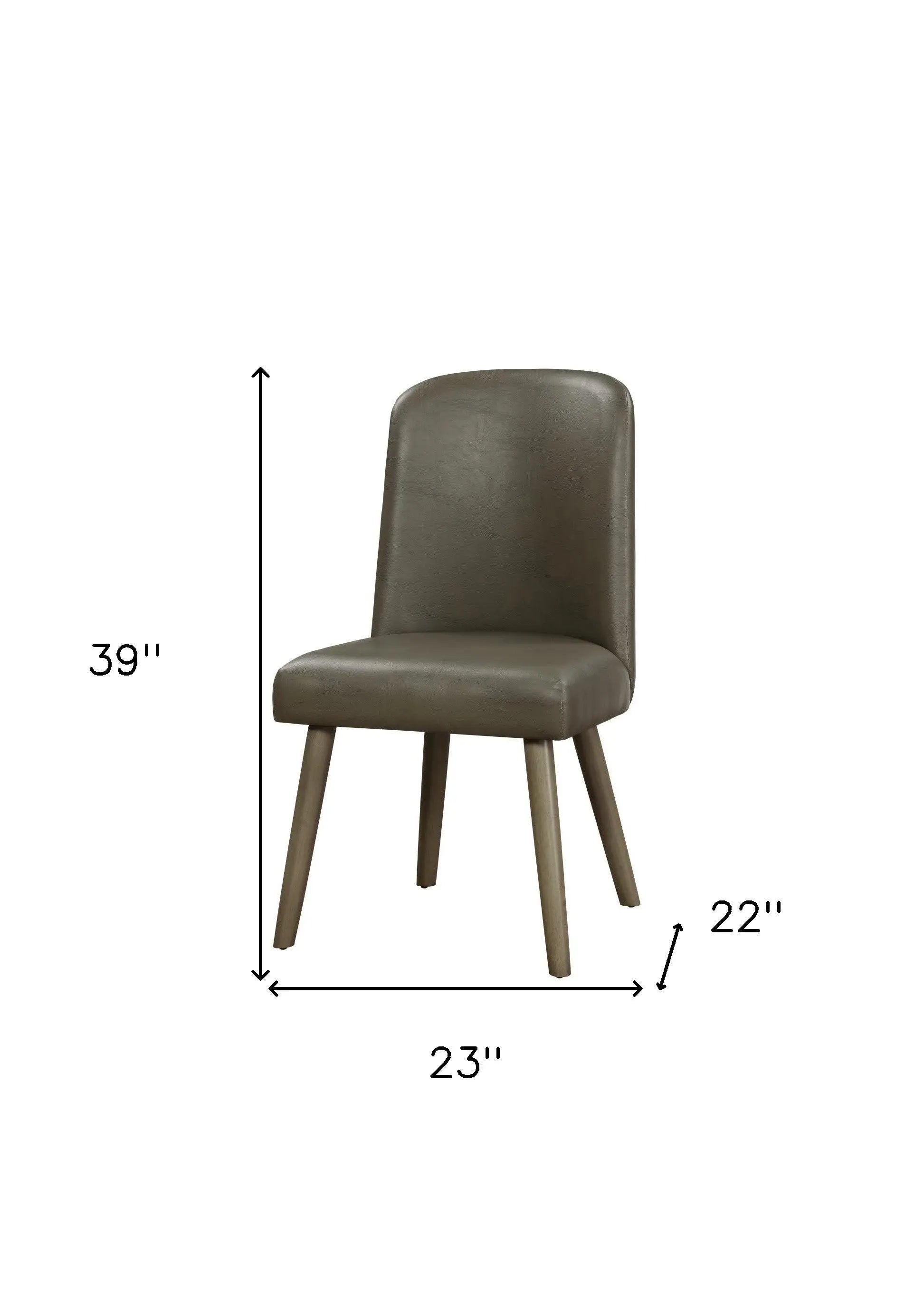 Brown leather dining chair with natural wood legs, modern design, 39" height, 22" seat height, 23" width.