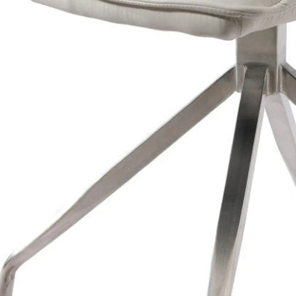 Set of Two White and Silver Faux Leather Swivel Dining Side Chairs Homeroots Kitchen & Dining