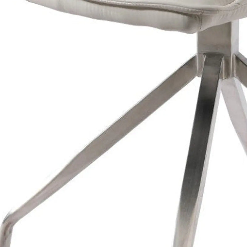 Set of Two White and Silver Faux Leather Swivel Dining Side Chairs Homeroots Kitchen & Dining