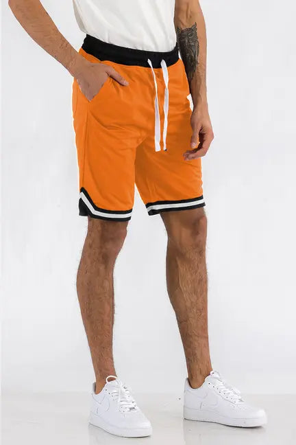 Men's orange athletic shorts with black and white trim, made from lightweight fabric, featuring an adjustable drawstring waist.