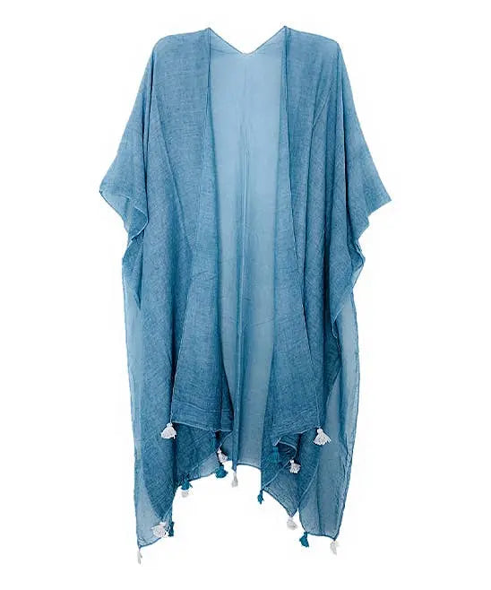 Light blue sheer kimono with white tassels, perfect for layering in warm weather. Ideal beach cover-up or casual style.