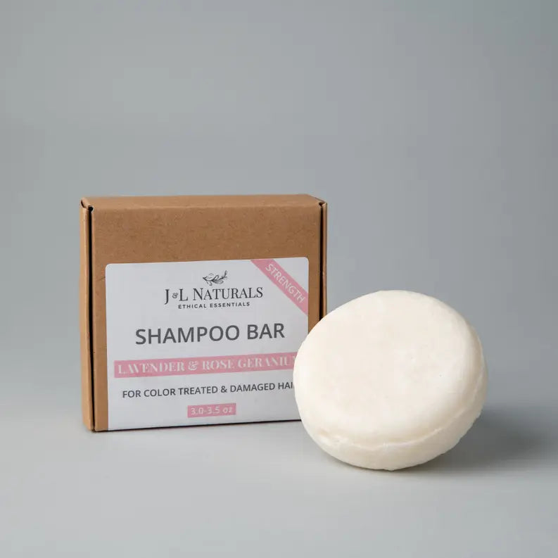 Lavender and rose geranium shampoo bar in white, eco-friendly packaging for color-treated and damaged hair.